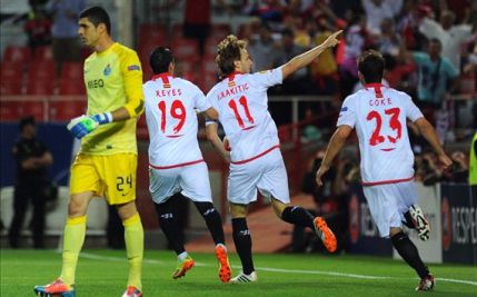 Sevilla celebrate their early goal which levelled the tie and set the Spanish side on their way to the semi-final stage of the competition. (Photograph courtesy of Getty Images)